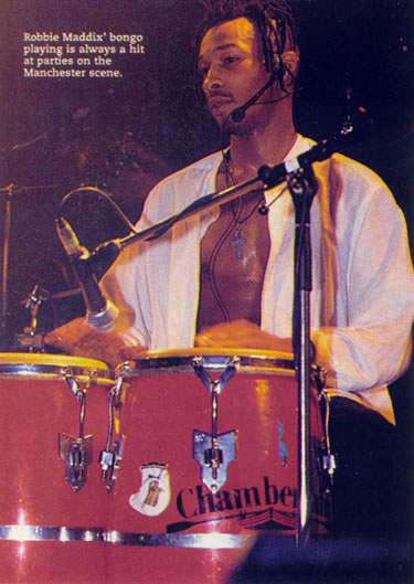 Robbie Maddix playing bongos