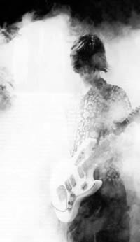Quite literally smokin: Stone Roses lead guitarist John Squire